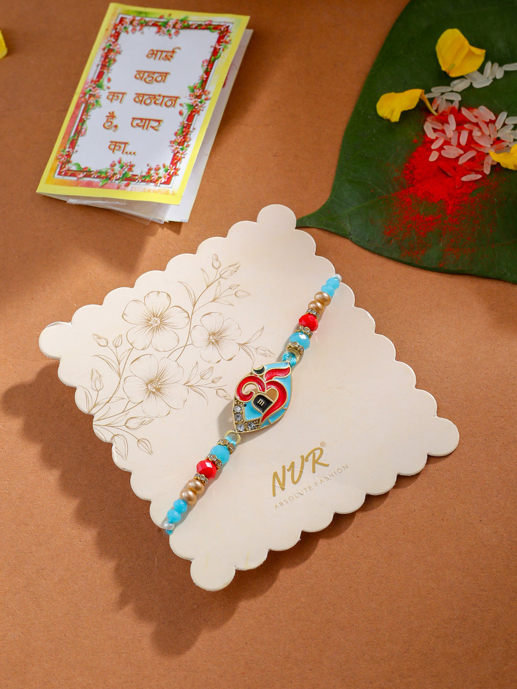 NVR Men Red & Blue Artificial Stones and Beads Om Thread Rakhi with Roli Chawal Chandan & Mishri