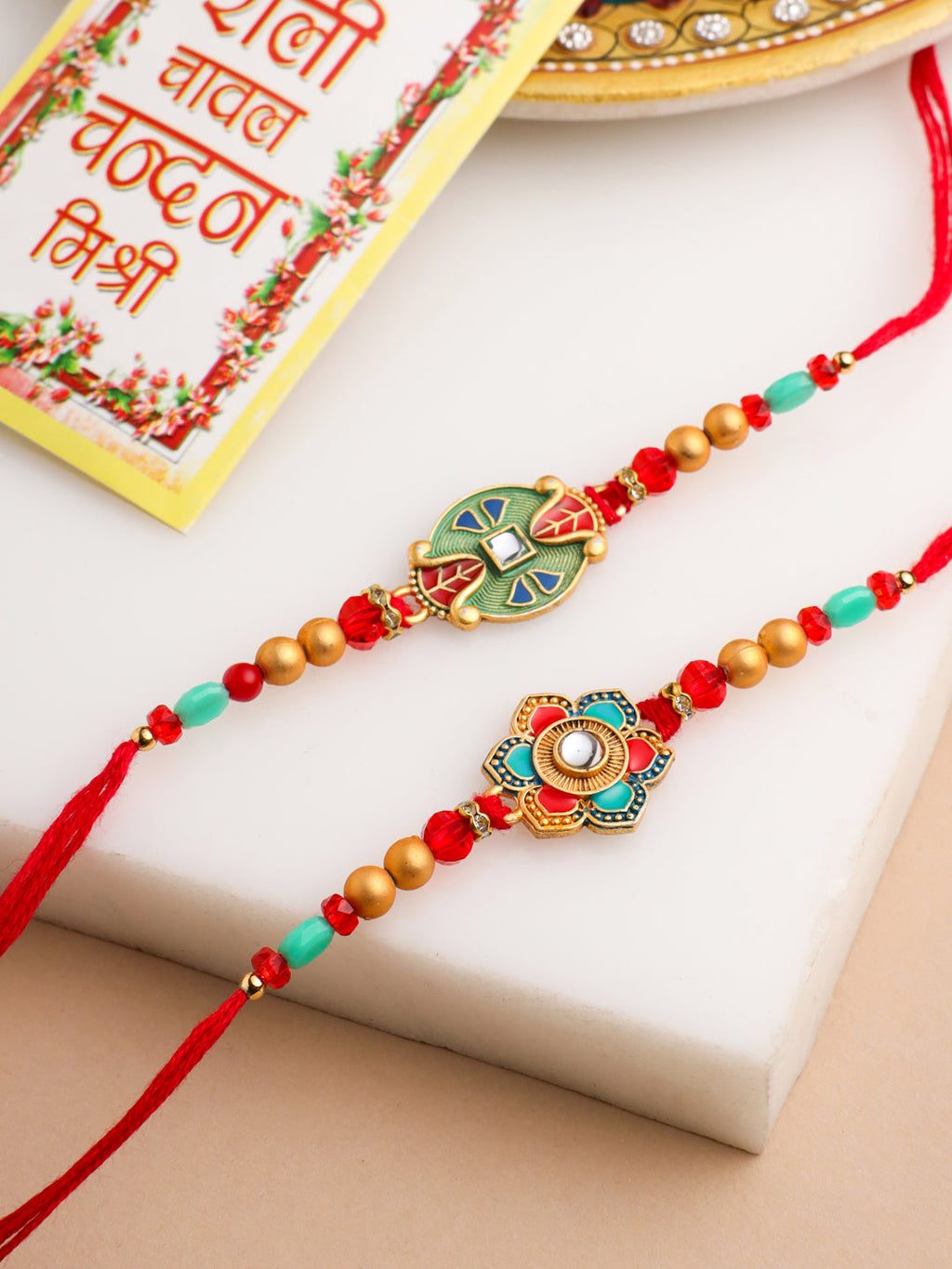 NVR Men Set of 2 Floral Design Red Artificial Stones & Beads Thread Rakhi With Roli Chawal Chandan & Mishri