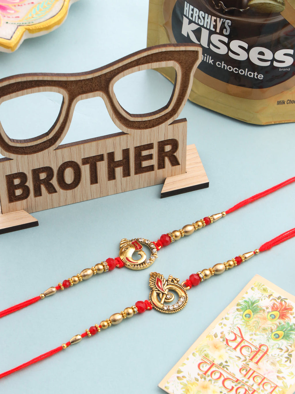 NVR Men Set of 2 Golden Red Religious Designer Ganesh Ji Thread Rakhi Combo