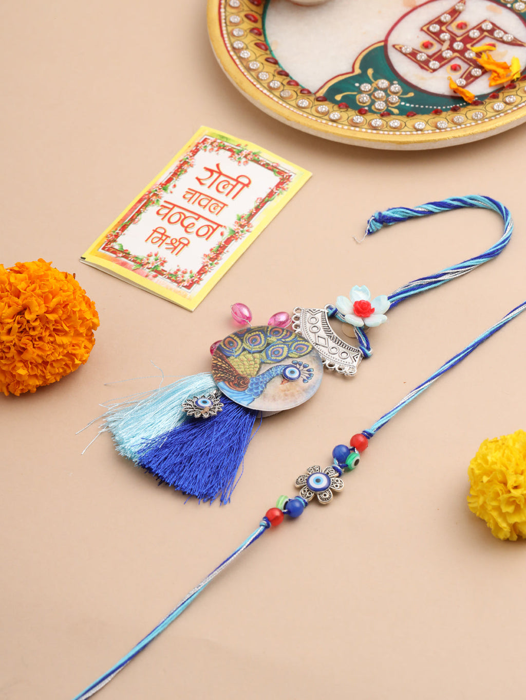 NVR Set of 2 Blue Evil Eye & Peacock Design Artificial Beads Bhaiya Bhabhi Rakhi With Roli Chawal Chandan & Mishri