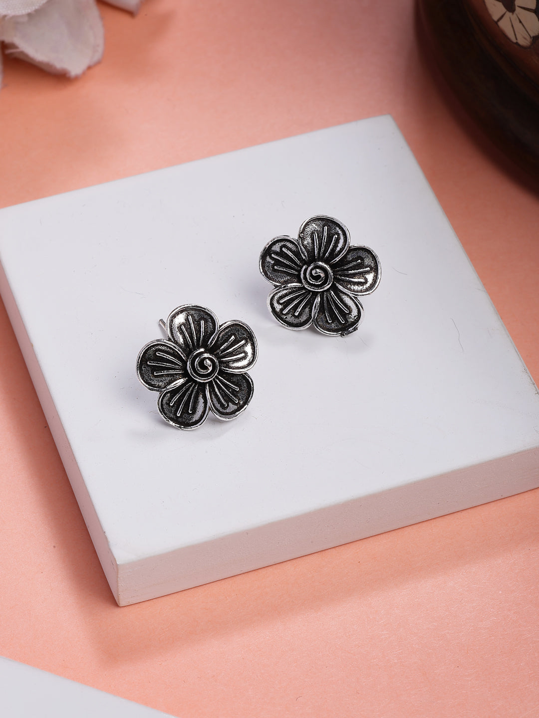 NVR Women Silver Plated Oxidized Floral Shape Stud Earrings