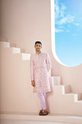 A Pink Sherwani Featuring Elegant Cross-Line Patterns Adorned With Intricate Floral Designs by Hilo Design