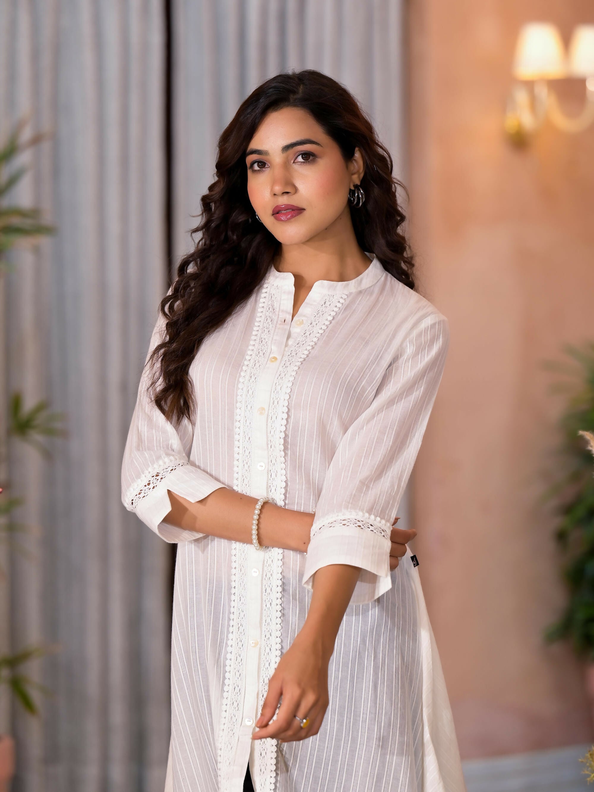Juniper Women's Off White Thread Embroidered Cotton Asymmetrical Kurta With Button Closure