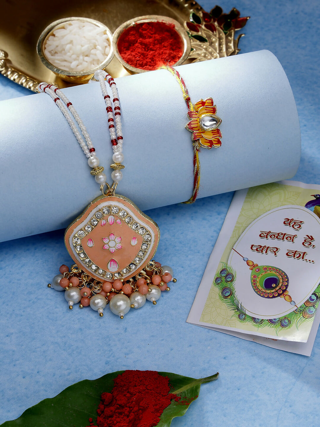NVR Women & Men Set of 2 Peach Lotus Shape Kundan Stone-Studded & Beaded Bhaiya Bhabhi Rakhi With Roli Chawal & Chocolate