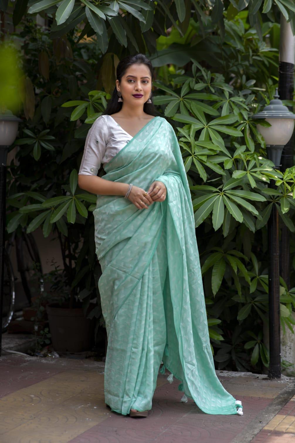 Green Poly Georgette Woven Design Saree with Unstitched Blouse - Hiral Fashion