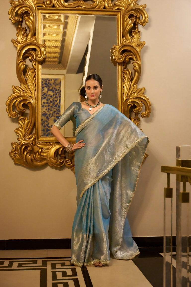 Vastranavya Sea Blue Tissue Shimmer Zari Weaving Work Saree with Unstitched Blouse