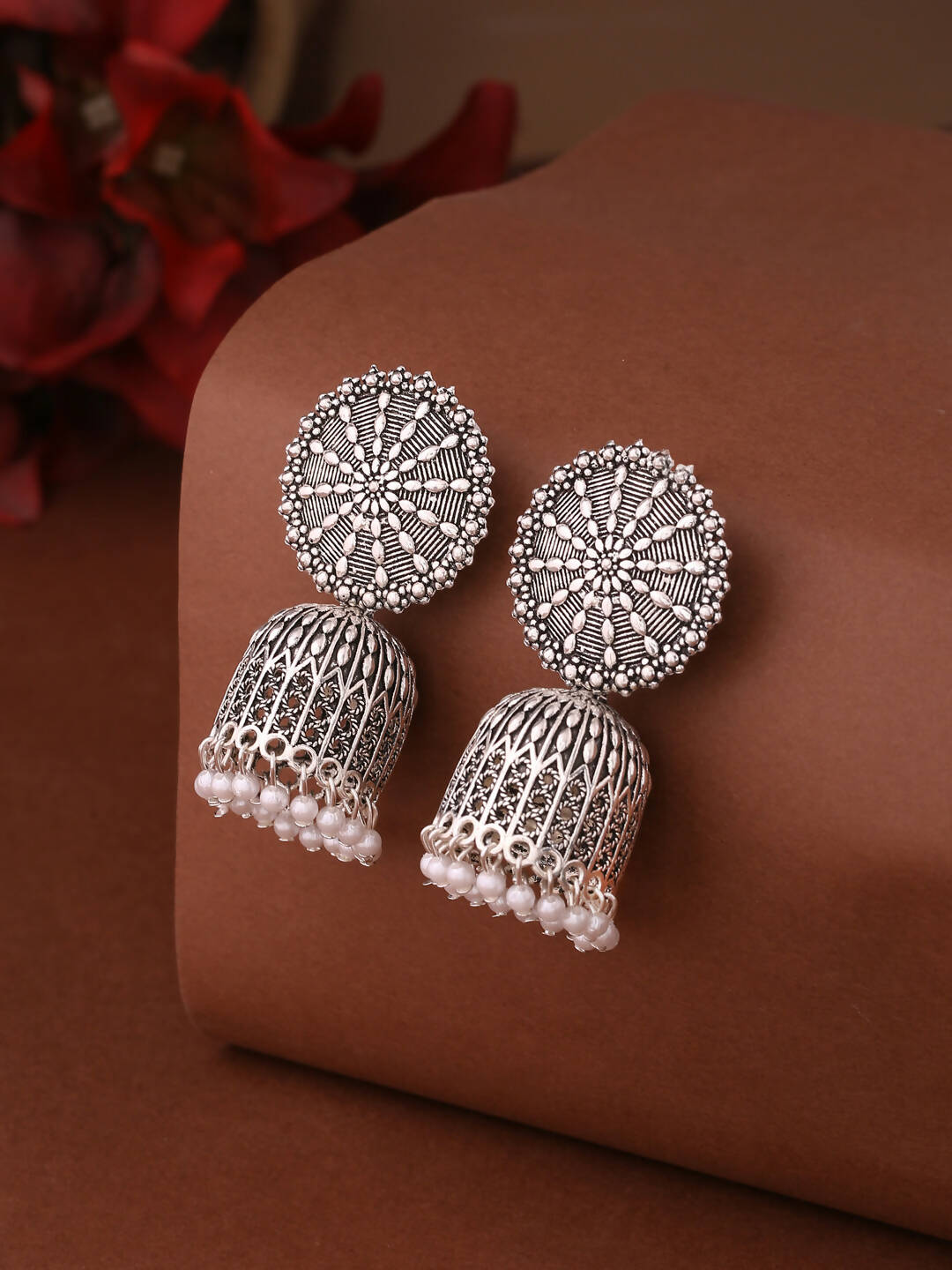 NVR Women Silver Toned Dome Shaped Jhumkas Earrings