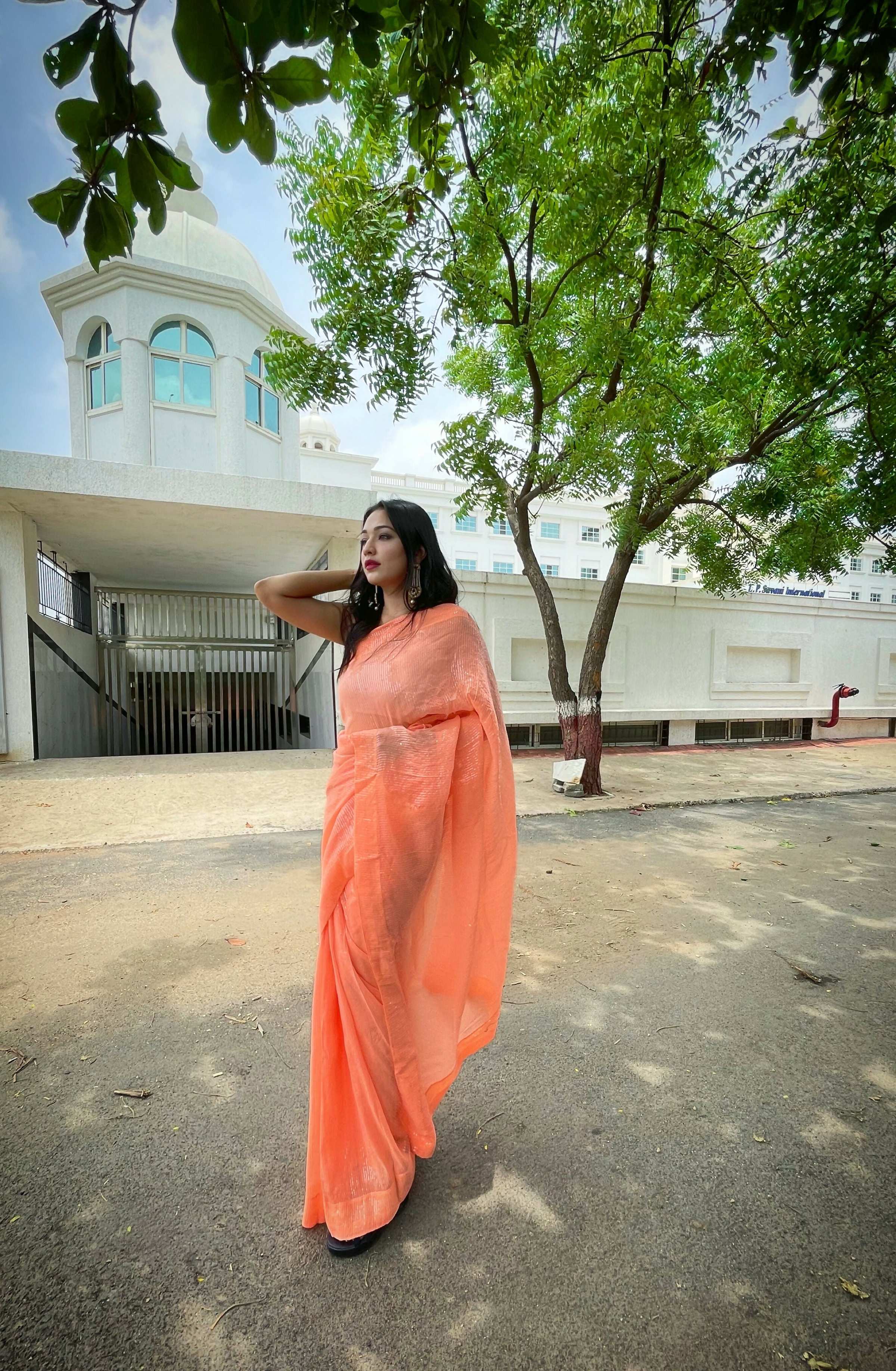 Vamsee Solid Color Sea Orange Georgette Saree