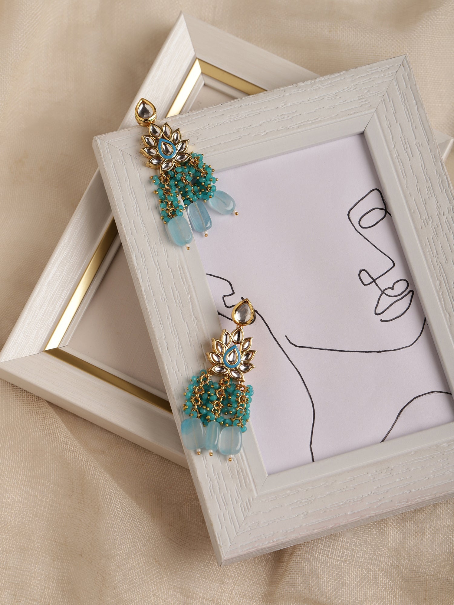Gold-Polished Turquoise Blue Kundan Studded Classic Drop Earrings - Ruby Raang