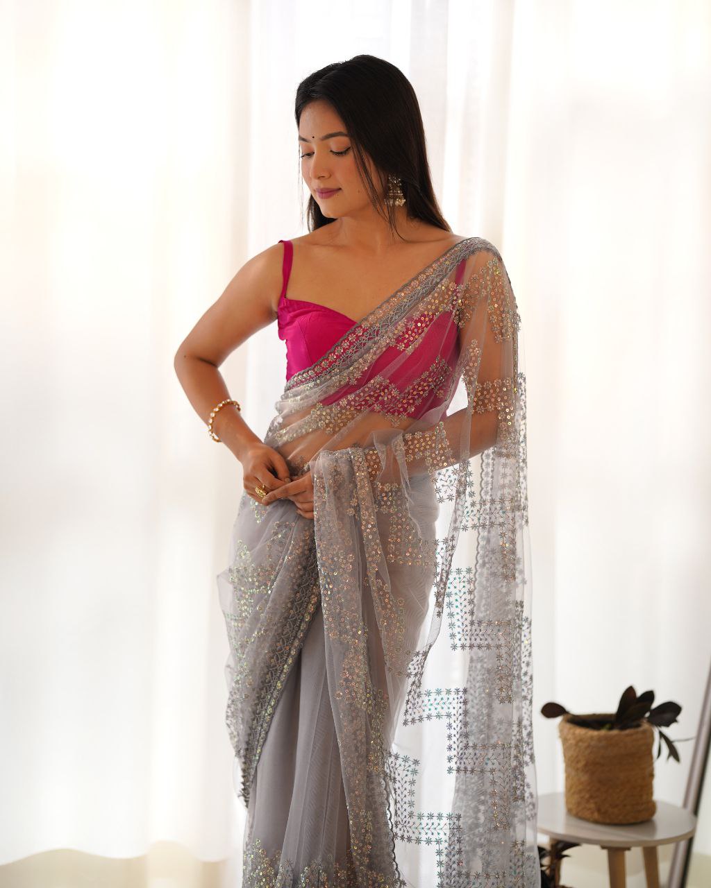Teeya Creation Grey Color Butterfly Net Heavy Work Saree