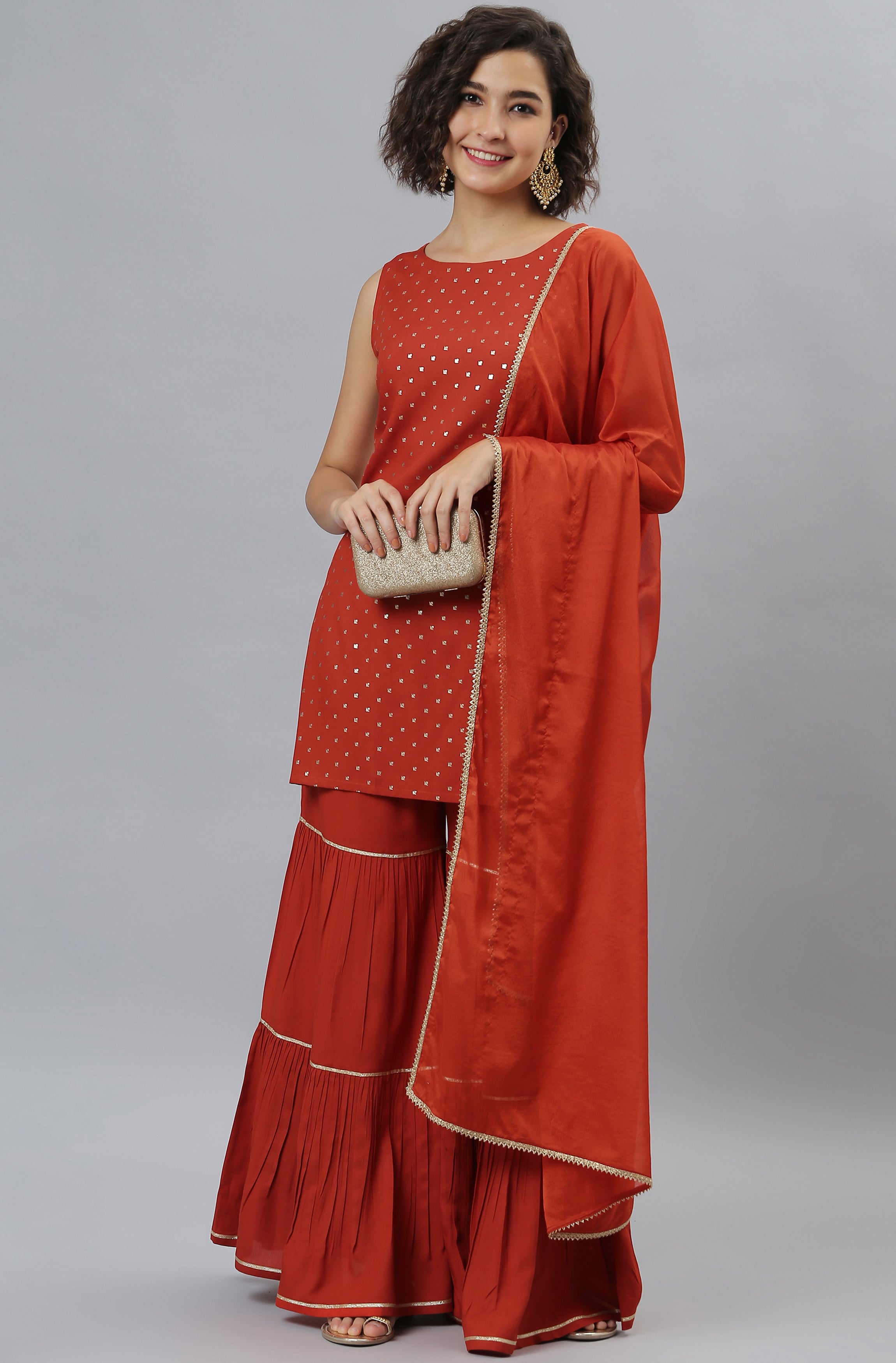 Janasya Women's Orange Rayon Foil Print Kurti With Sharara And Dupatta