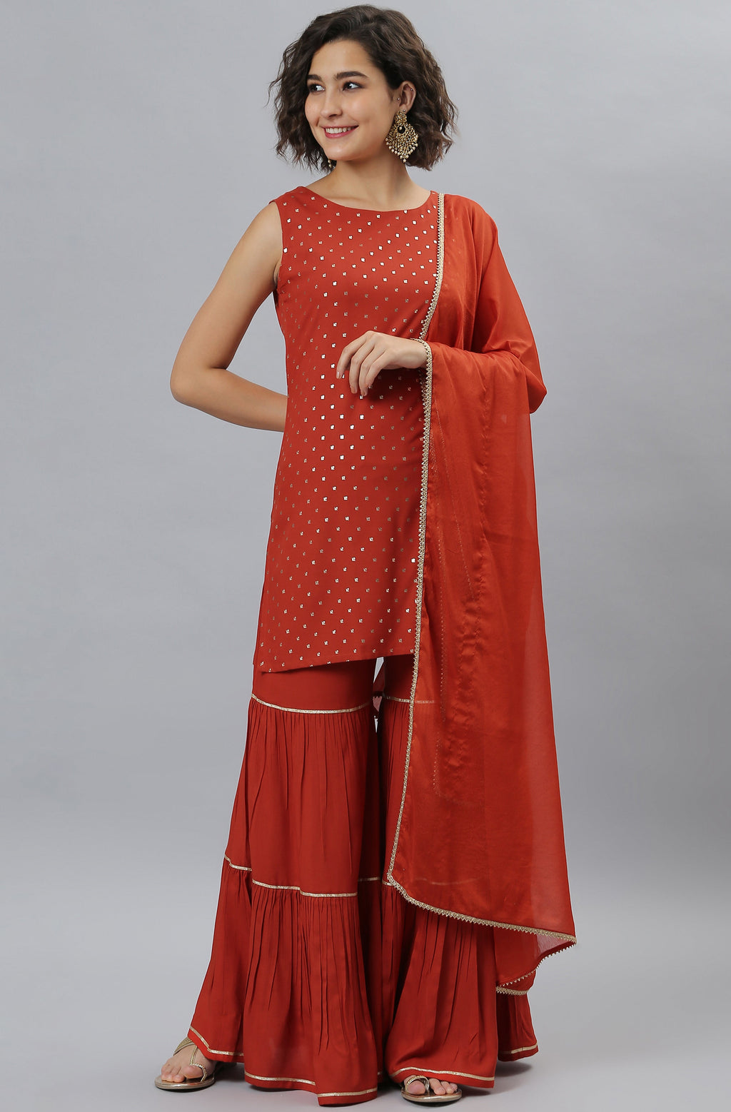 Janasya Women's Orange Rayon Foil Print Kurti With Sharara And Dupatta