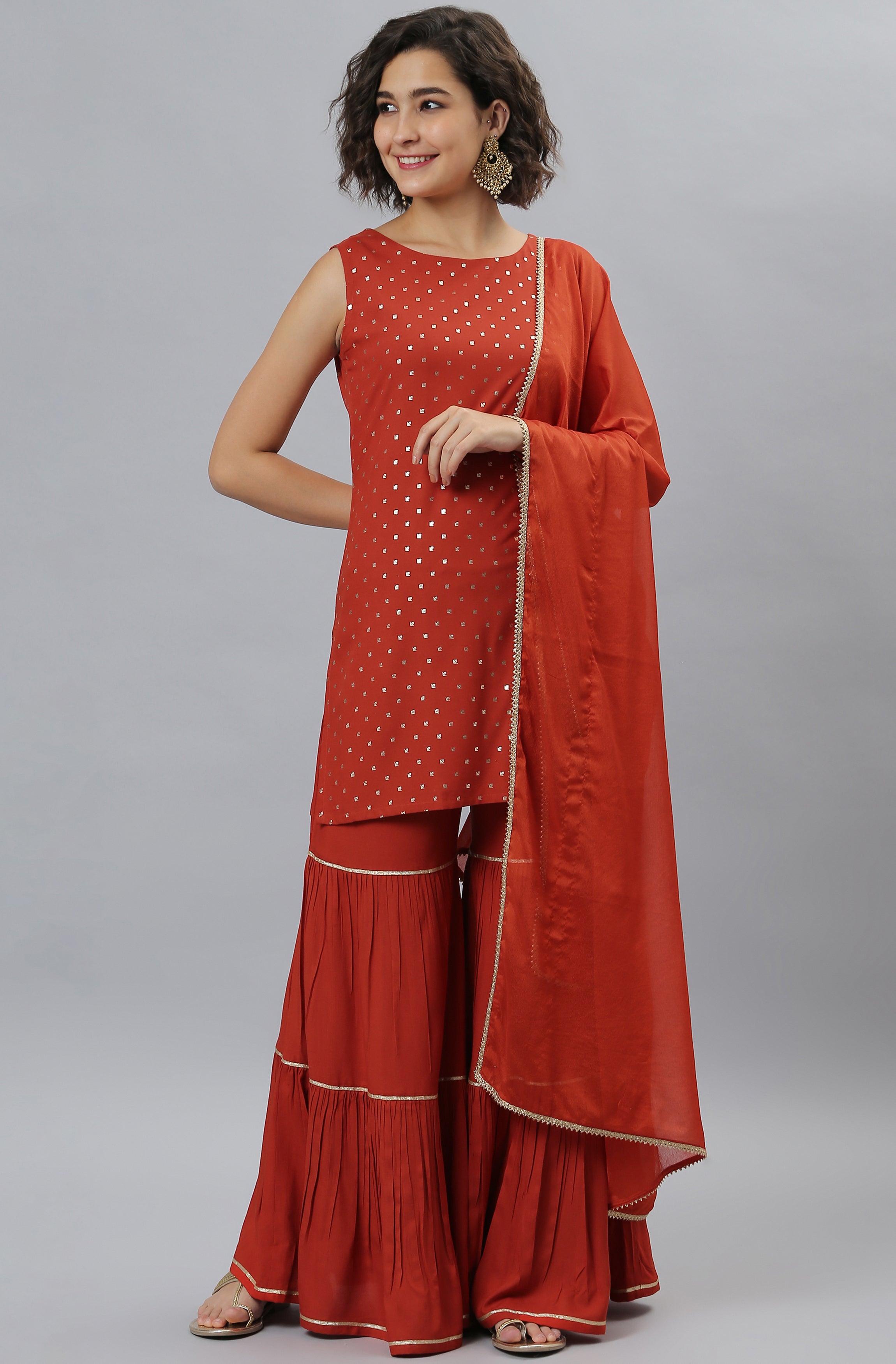 Janasya Women's Orange Rayon Foil Print Kurti With Sharara And Dupatta