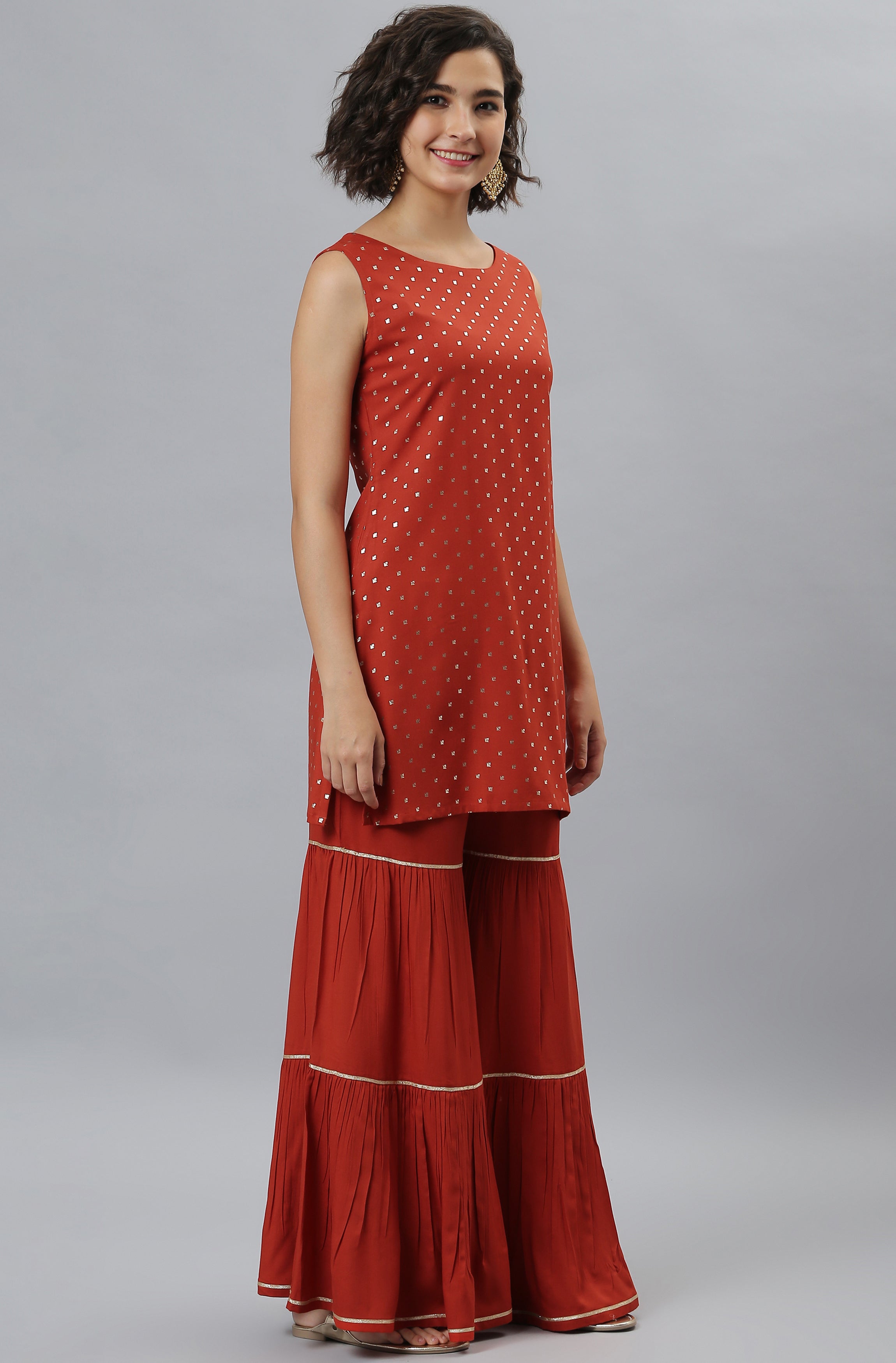 Janasya Women's Orange Rayon Foil Print Kurti With Sharara And Dupatta