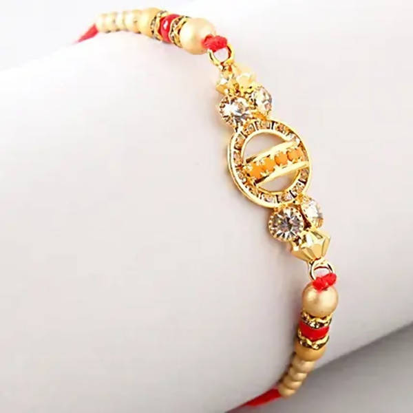 Elegant Meenakari Rakhi And Cashew Jar