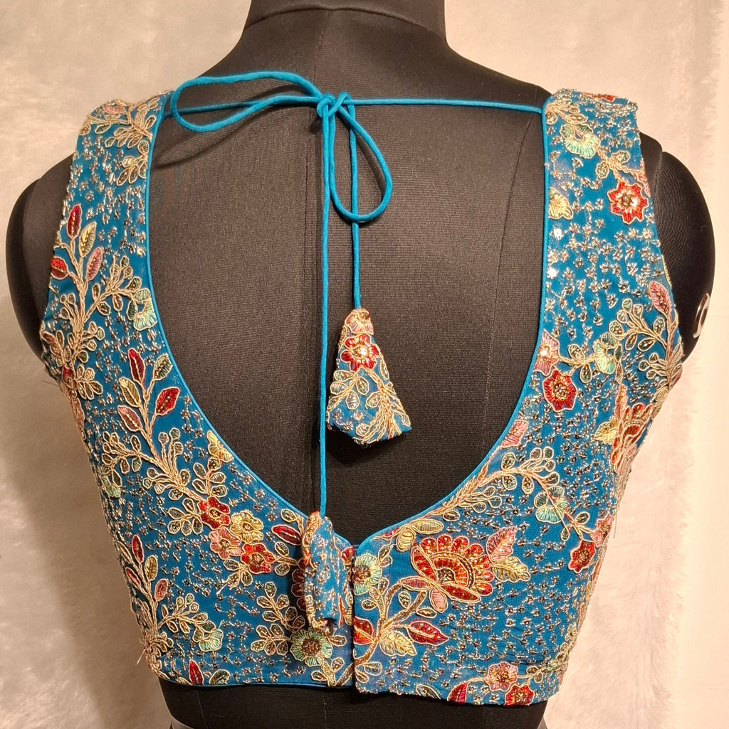 Kia Fashions Turquoise Blue Georgette Multi Color Emb & Sqn Readymade Blouse