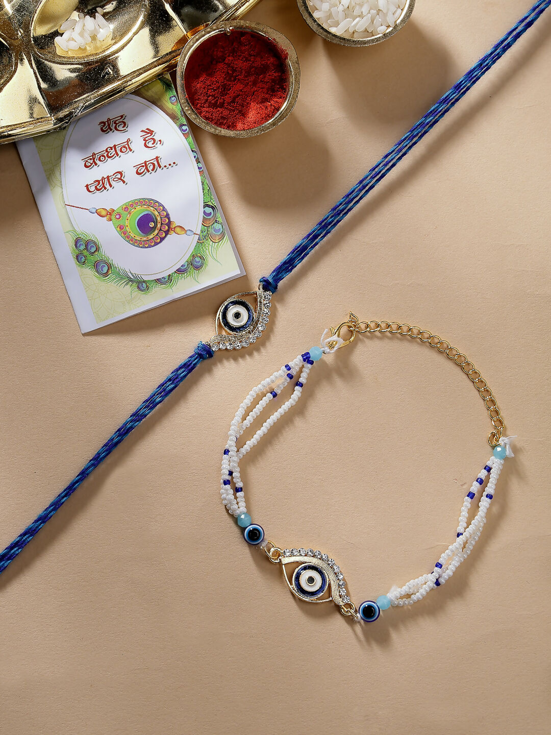 NVR Women & Men Set of 2 Blue Evil Eye Bhaiya Bhabhi Rakhi Set With Roli Chawal