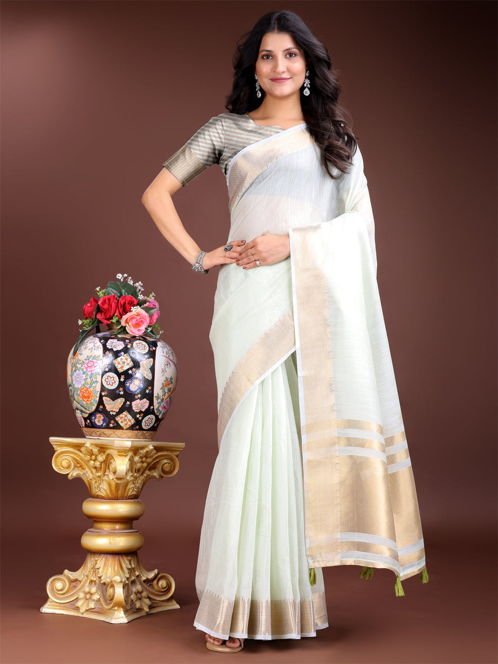 Shree Shyam Fashion Elegant Light Green Woven Linen Saree with Contrast Zari Border & Tassels - Soft & Breathable Party Wear