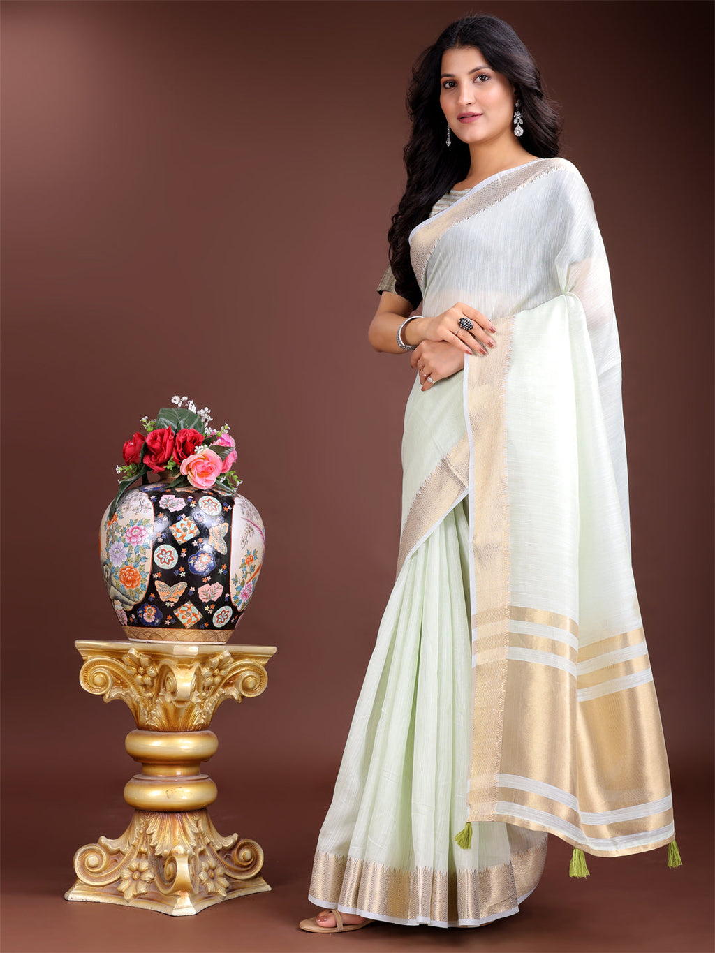 Shree Shyam Fashion Elegant Light Green Woven Linen Saree with Contrast Zari Border & Tassels - Soft & Breathable Party Wear