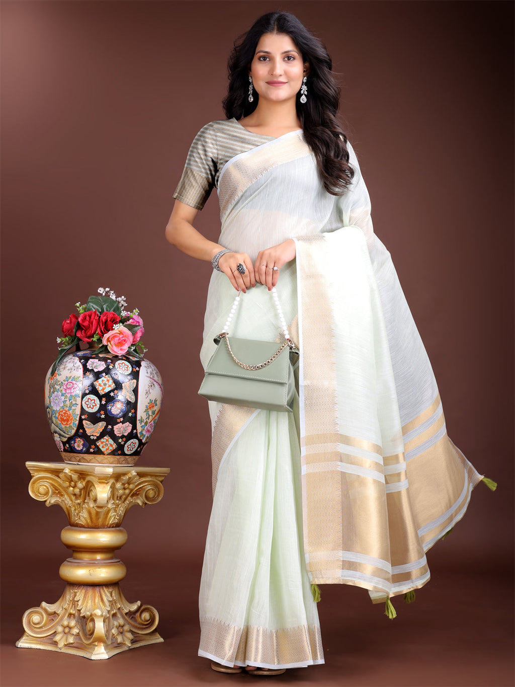 Shree Shyam Fashion Elegant Light Green Woven Linen Saree with Contrast Zari Border & Tassels - Soft & Breathable Party Wear