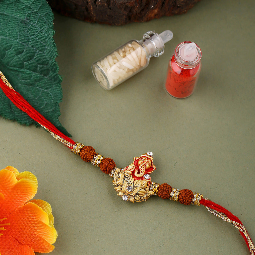 trueBrowns X Voylla Divine Rudraksha Ganesha Rakhi With Roli Chaawal Pack