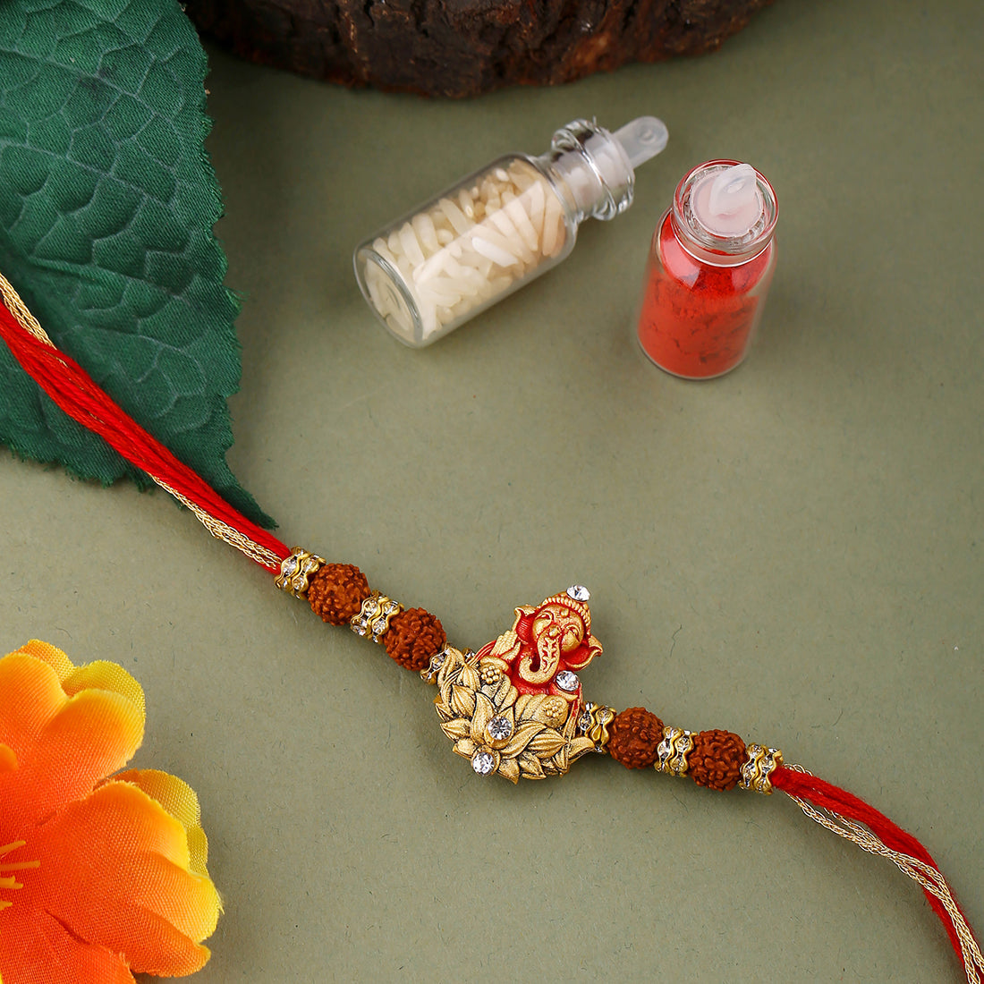 trueBrowns X Voylla Divine Rudraksha Ganesha Rakhi With Roli Chaawal Pack
