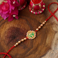 trueBrowns X Voylla Beige Beaded Enamel Rakhi With Roli Chaawal Pack