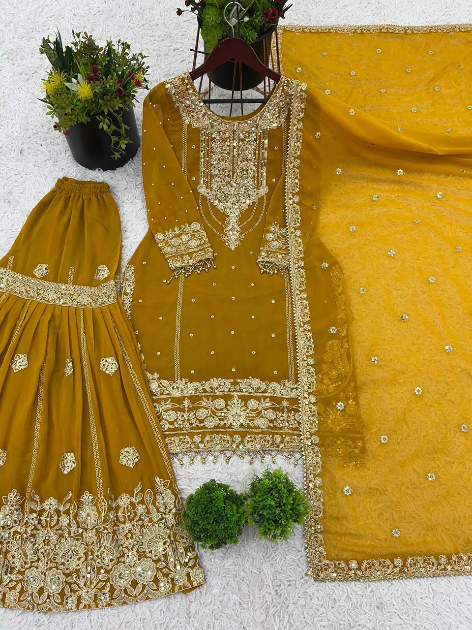 Prazu Fashion Yellow Georgette Embroidered Rivet Moti Work Palazzo Suit
