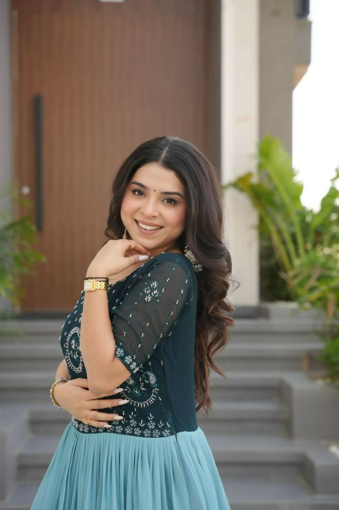 Vastranavya Teal Faux Blooming With Beads Embroidered work and Rich Floral Pedding Digital Print Gown