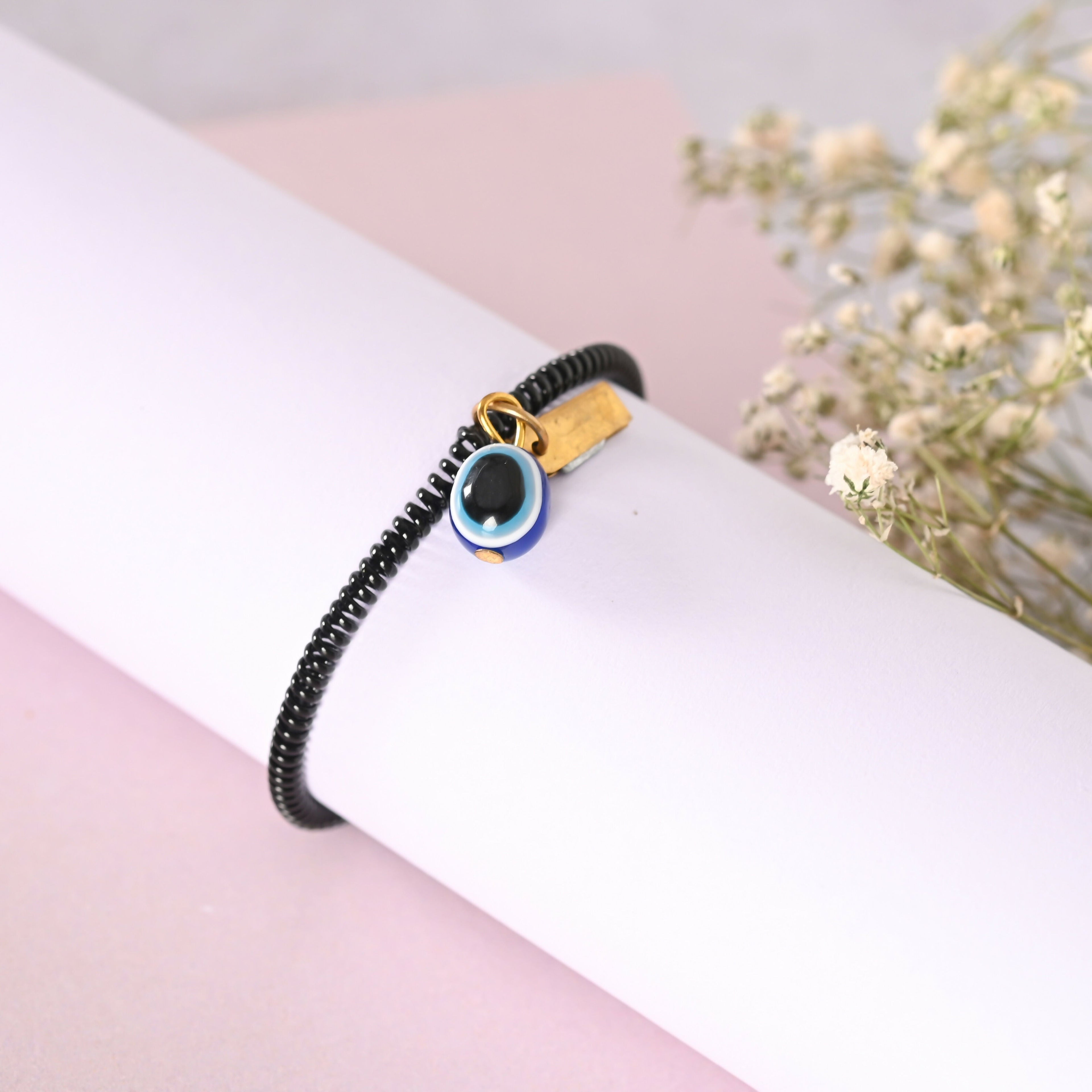 NVR Men & Women Black Evil Eye Crystal Spring Ring Bracelet