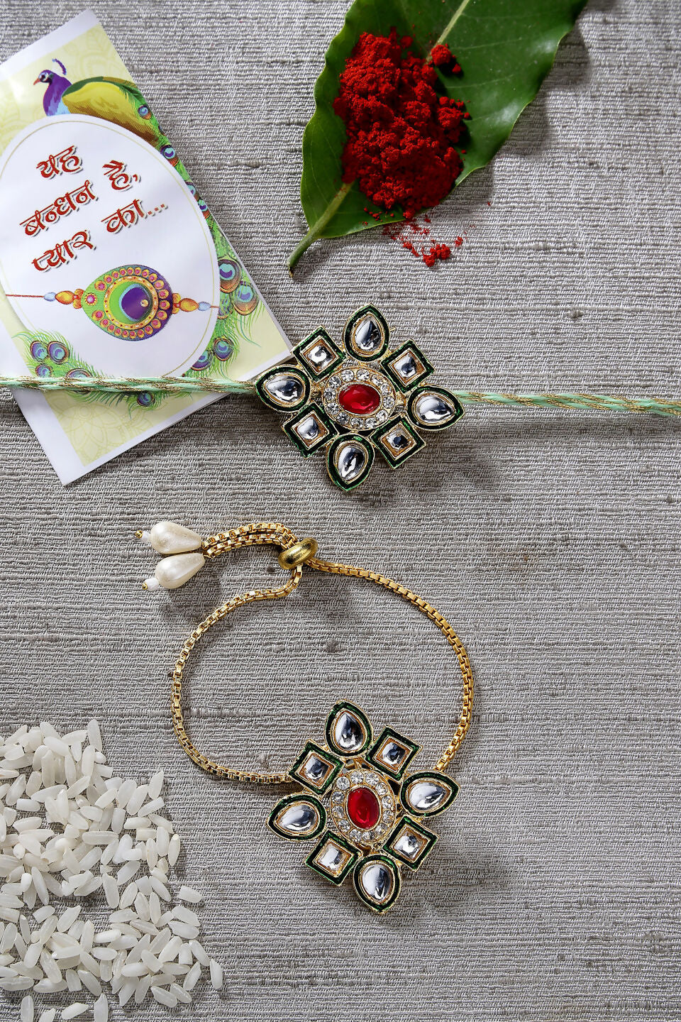 NVR Women & Men Set of 2 Gold Kundan-Studded Handcrafted Wraparound Rakhi Set With Roli Chawal & Chocolate