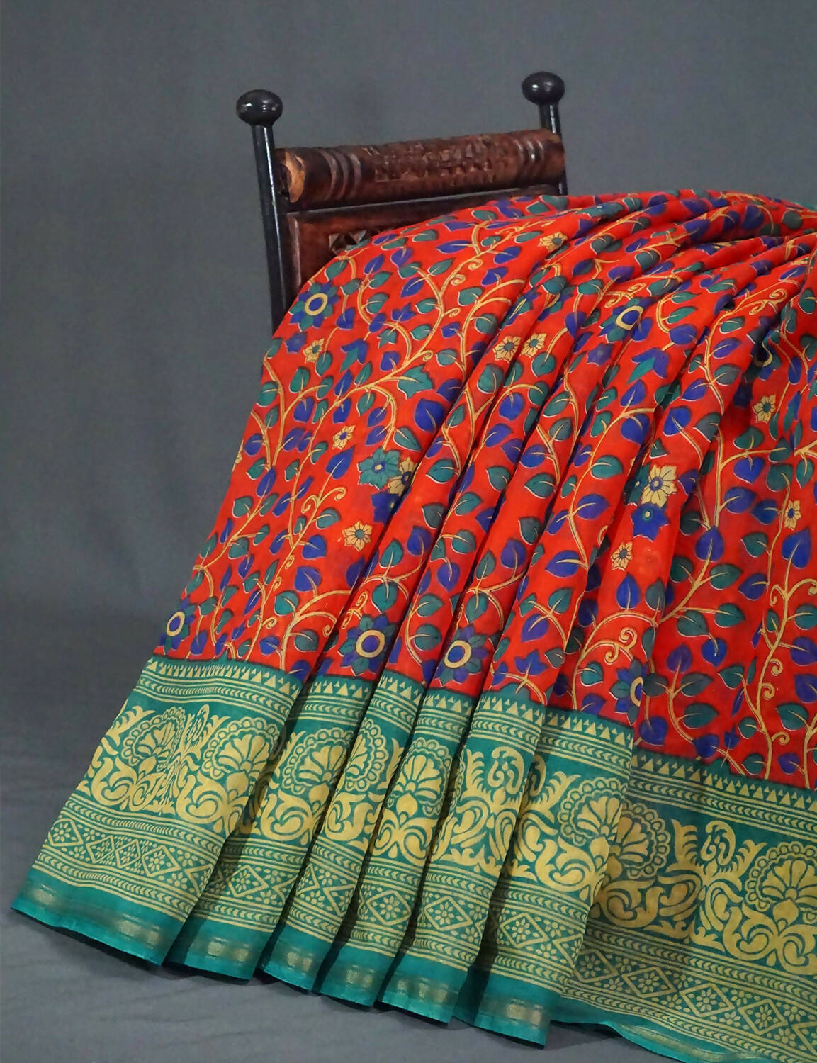 Multi Shades Of Tomato Red Kalamkaari Design Semi Chanderi Saree With Contrast Blouse By Gayathri Reddy Designer Studio