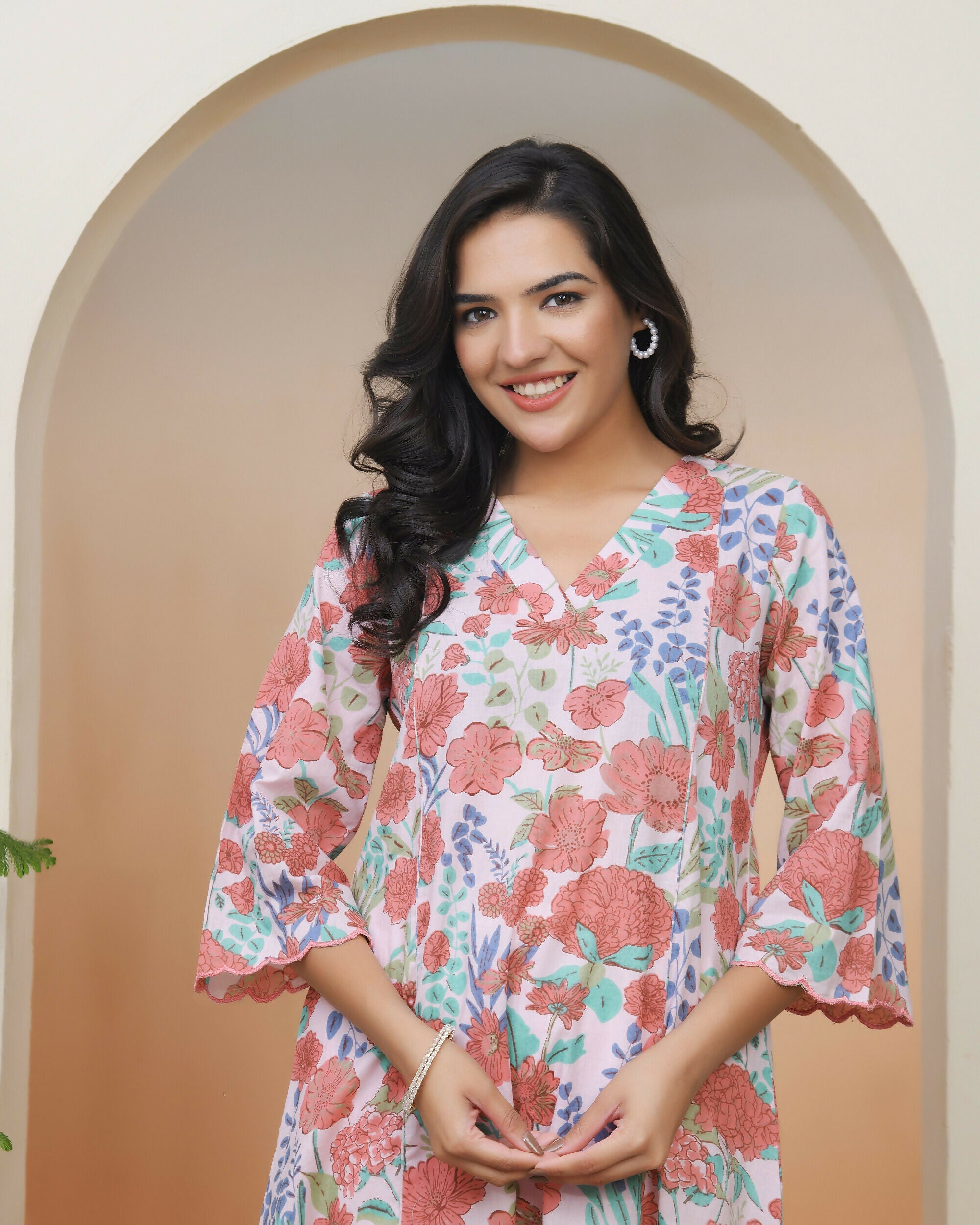Vaasva Women Peach Floral Cotton Printed Flare Kurti With Pant