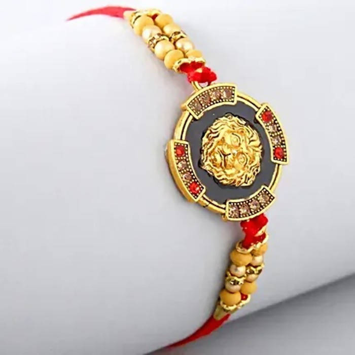 Traditional Lion Face Rakhi & 2 Dairy Milk Silk