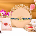 trueBrowns X Voylla Gold Navratan Swastik Rakhi For Brother