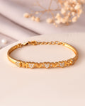 VOJ Women Gold Polished Heart Shaped Stone Studded Link Bracelet