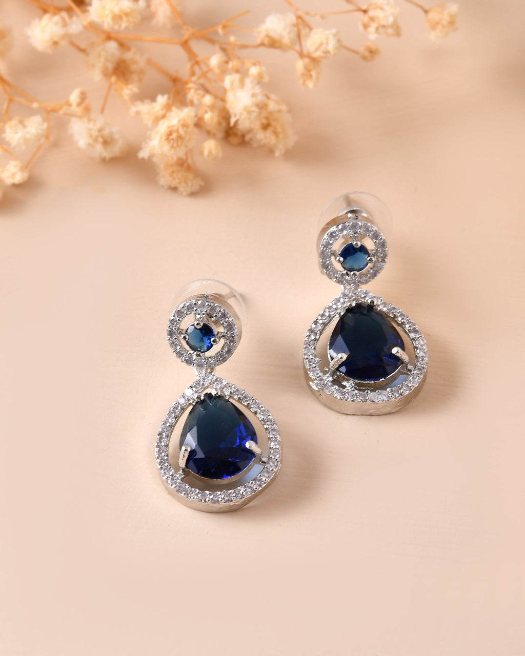 VOJ Silver Plated Blue Stone Studded Teardrop Shaped Earrings