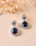 VOJ Silver Plated Blue Stone Studded Teardrop Shaped Earrings