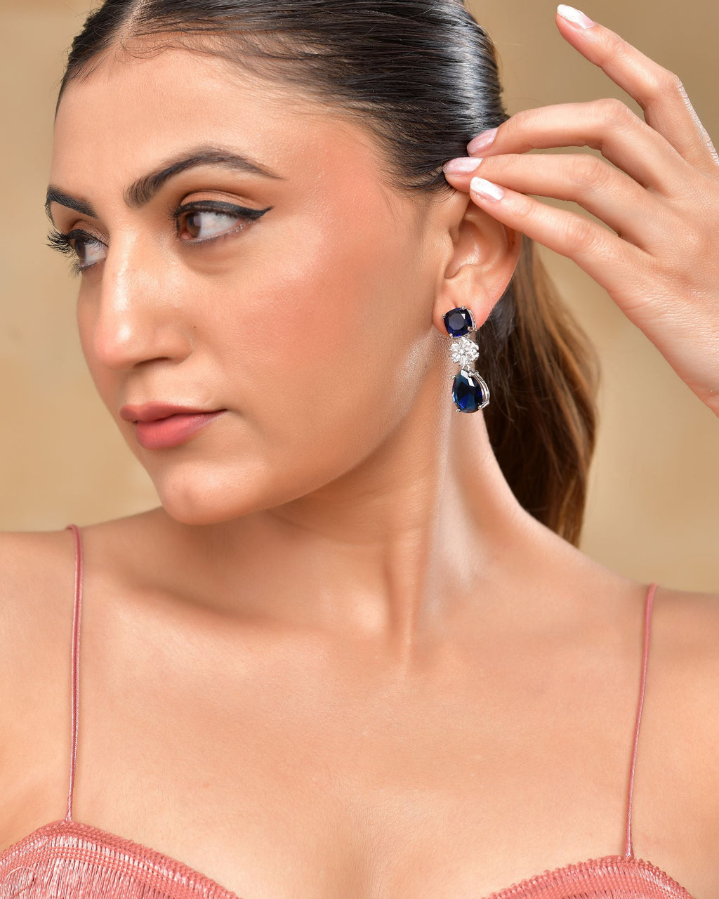 VOJ Silver Plated Blue Stone Studded Floral Shaped Studs Earrings