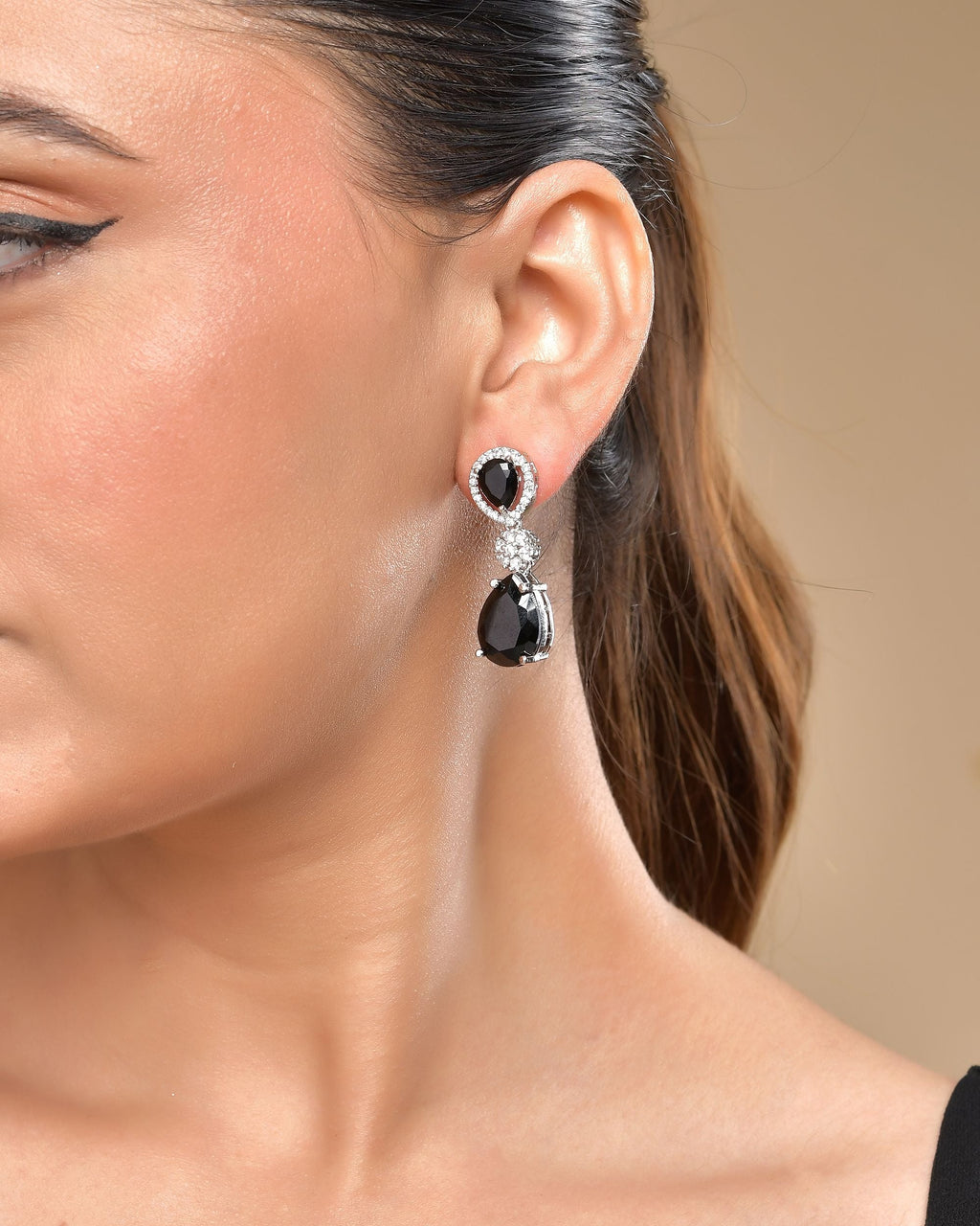 VOJ Silver Plated Black Stone Studded Floral Shaped Studs Earrings