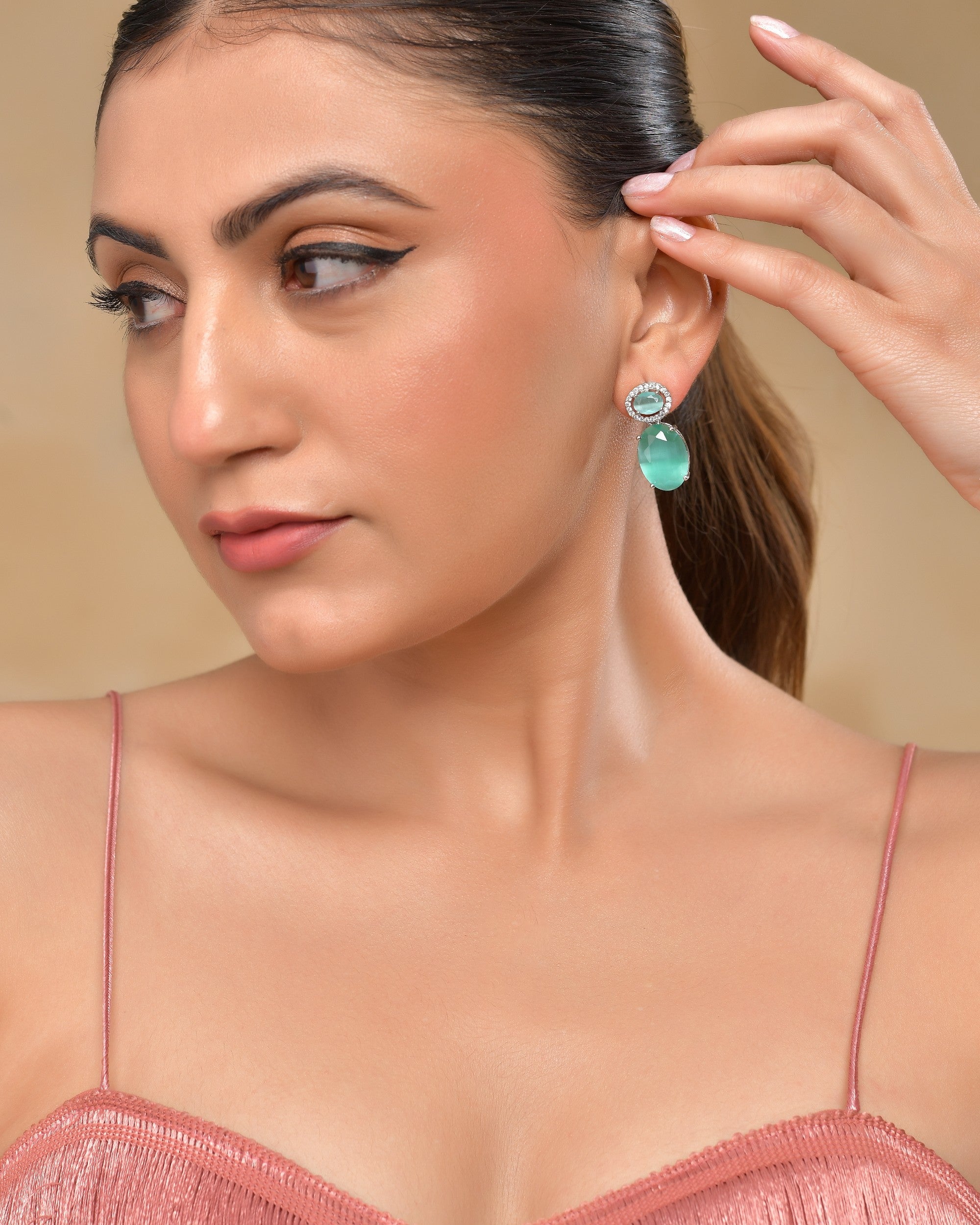 VOJ Silver Plated Sea Green Stone Studded Ad Earrings