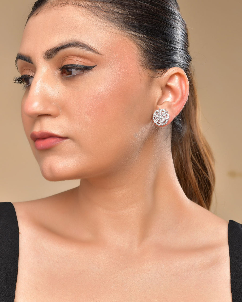 VOJ Silver Plated Floral Shape Ad Stone Studded Studs Earrings