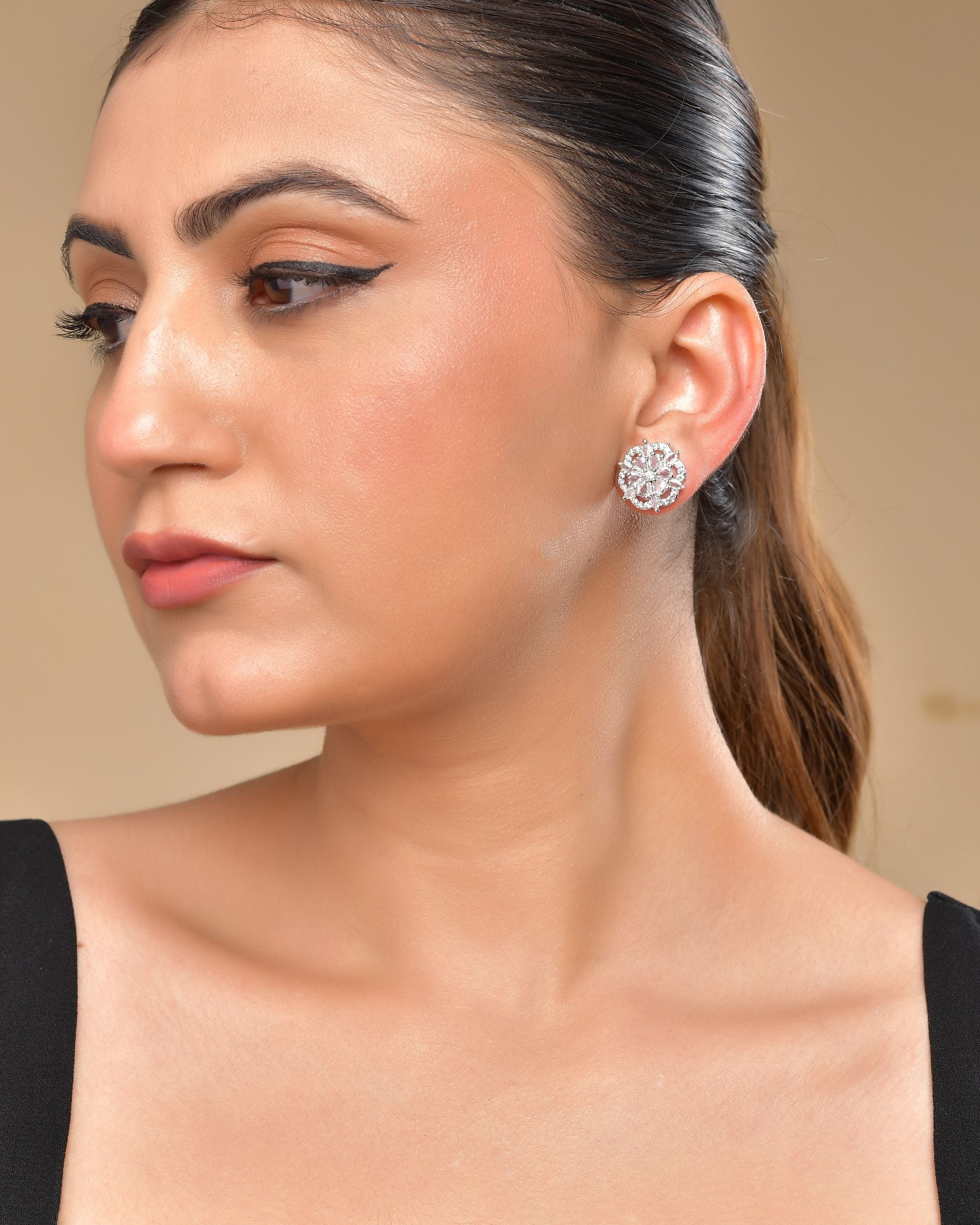 VOJ Silver Plated Floral Shape Ad Stone Studded Studs Earrings