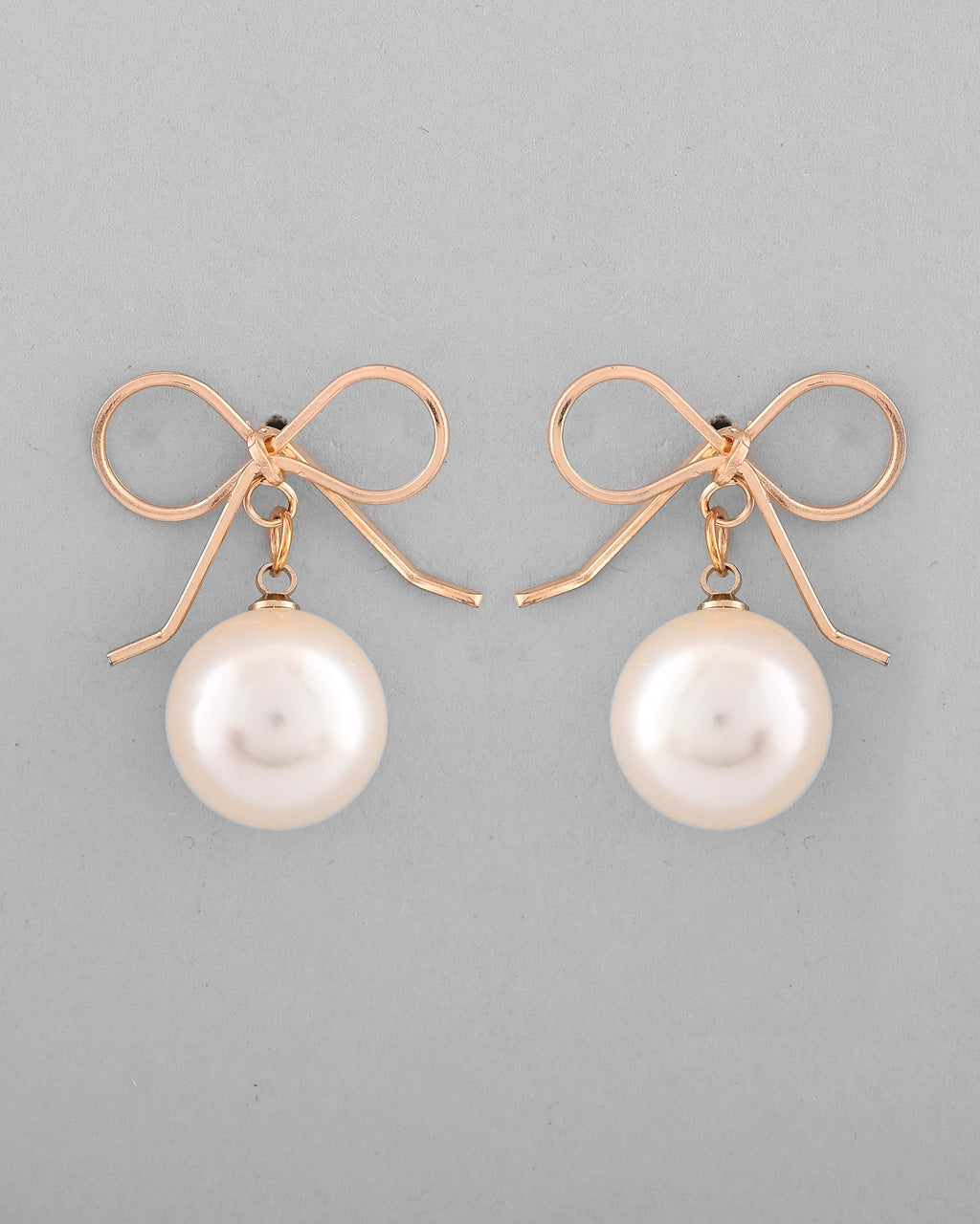 VOJ Gold-Polished Pearl & Bow Shaped Classic Drop Earrings
