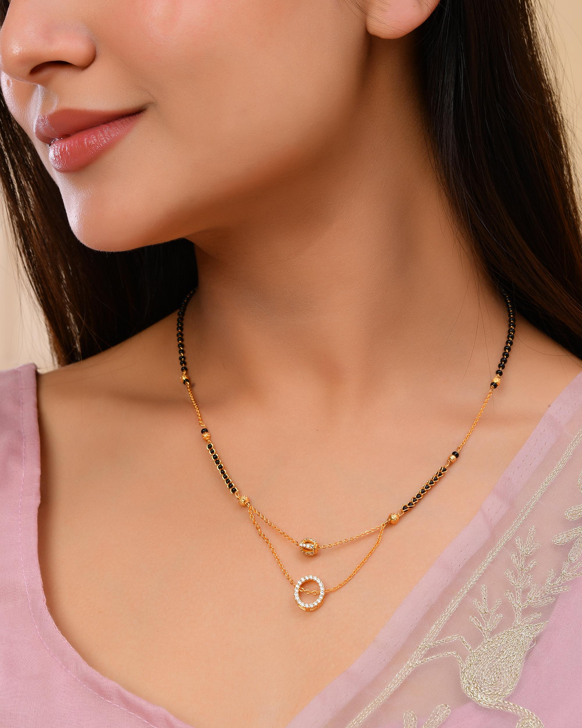VOJ Gold-Polished Ad Studded Oval Shaped Mangalsutra