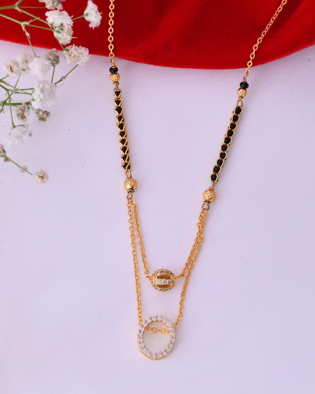 VOJ Gold-Polished Ad Studded Oval Shaped Mangalsutra