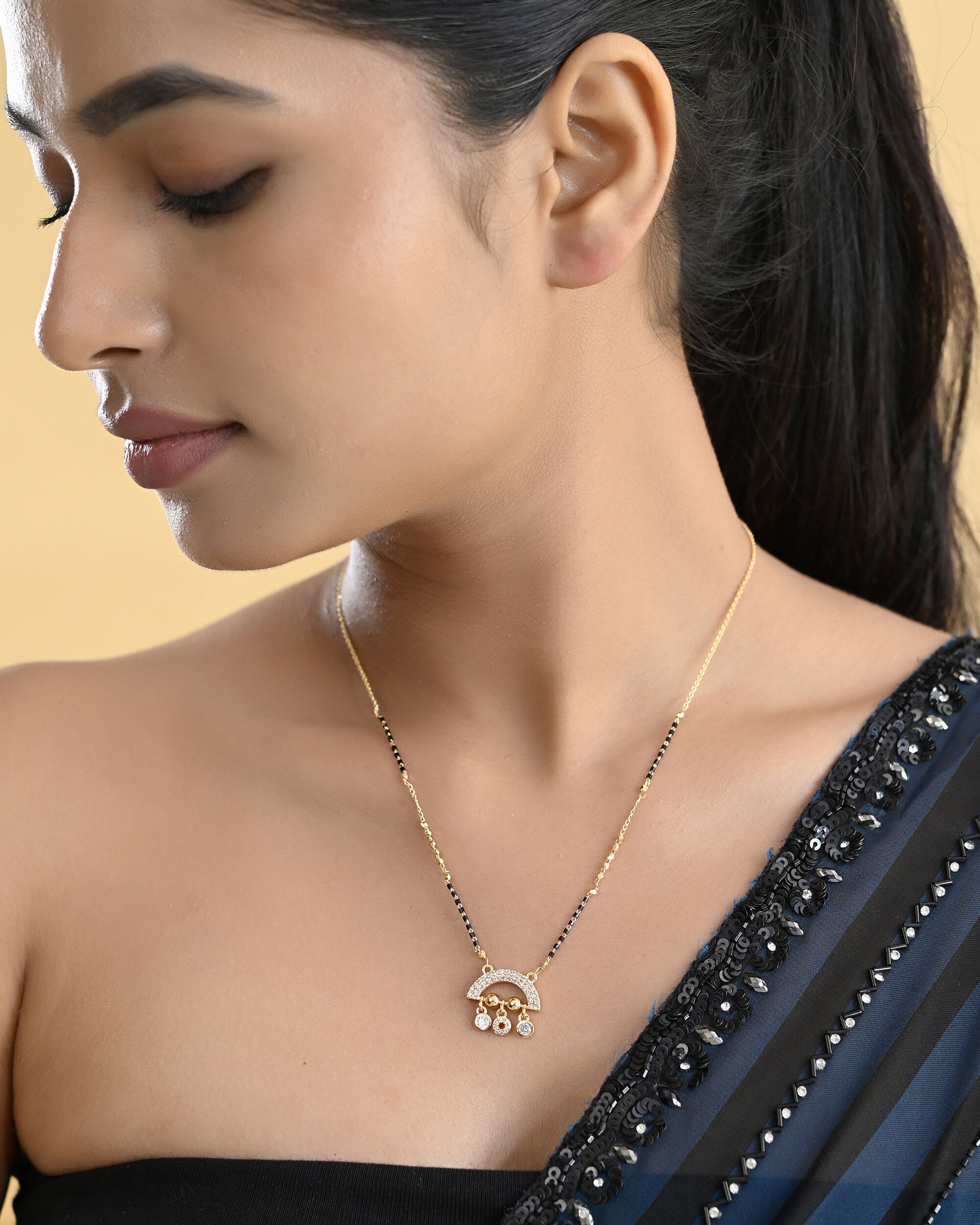 VOJ Gold-Polished AD Studded Half Done Shape Mangalsutra