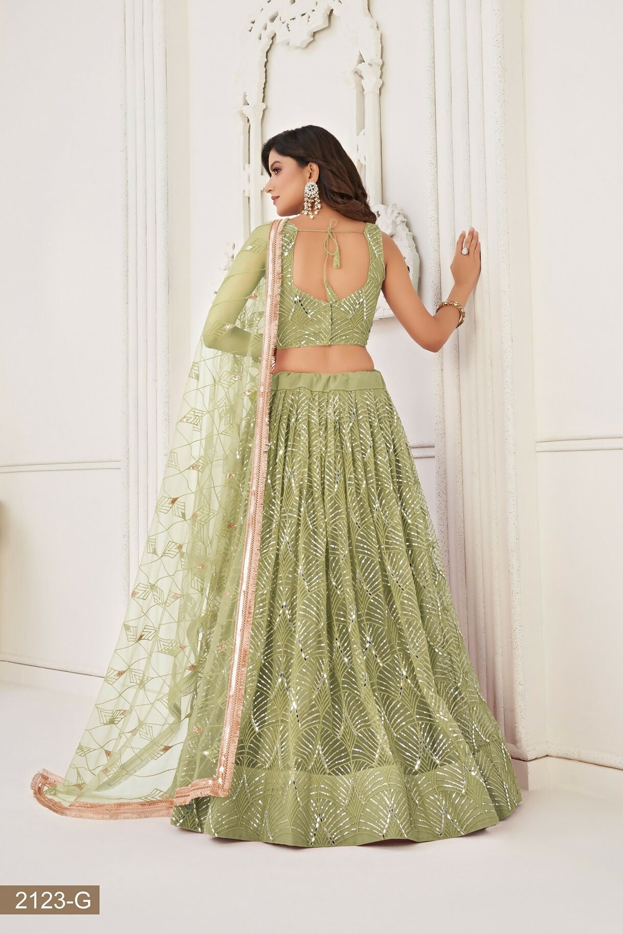 Eilara Glamorous Pista Green Net With Sequins And Thread Embroidery Real Mirror Work Lehenga Choli For Wedding
