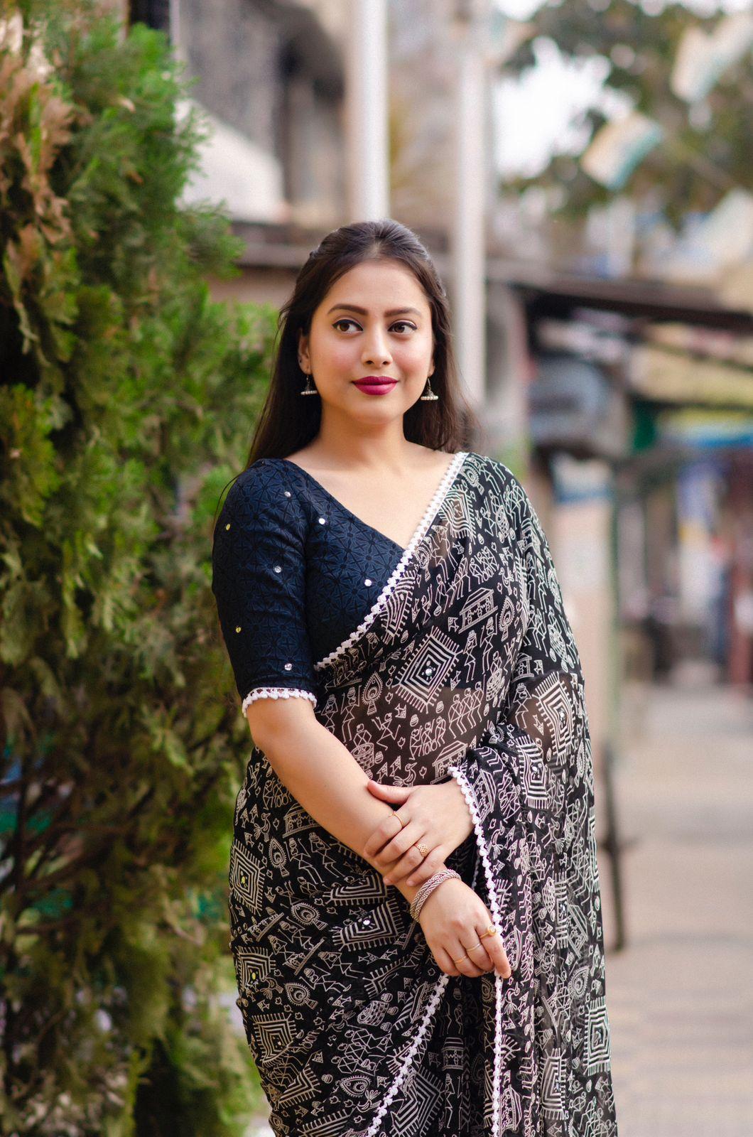 Black Poly Georgette Ethnic Motifs Saree with Unstitched Blouse - Hiral Fashion