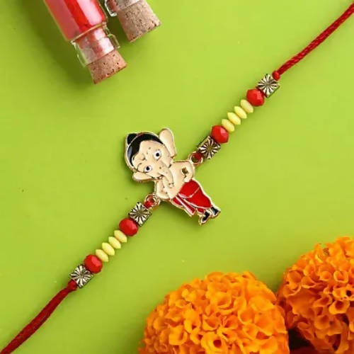Cute Ganesha Rakhi & Kaju Rolls Box